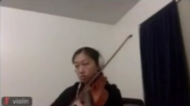 Stanford orchestra member using Jacktrip and recorded on Zoom