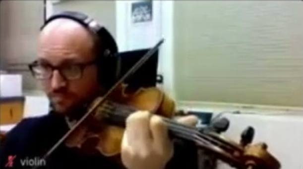 Stanford orchestra member using Jacktrip and recorded on Zoom