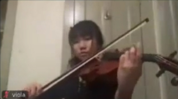 Stanford orchestra member using Jacktrip and recorded on Zoom