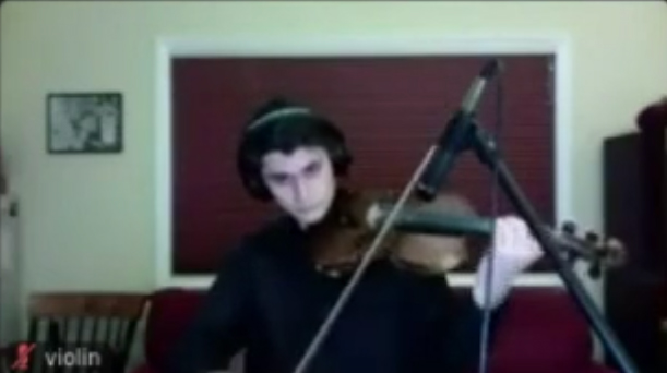 Stanford orchestra member using Jacktrip and recorded on Zoom